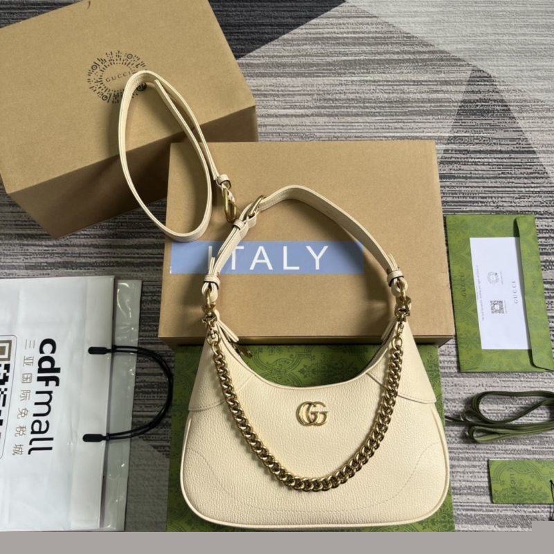 G*u*i top handle bags